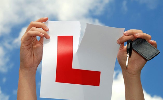 Tearing up L plate after passing driving test